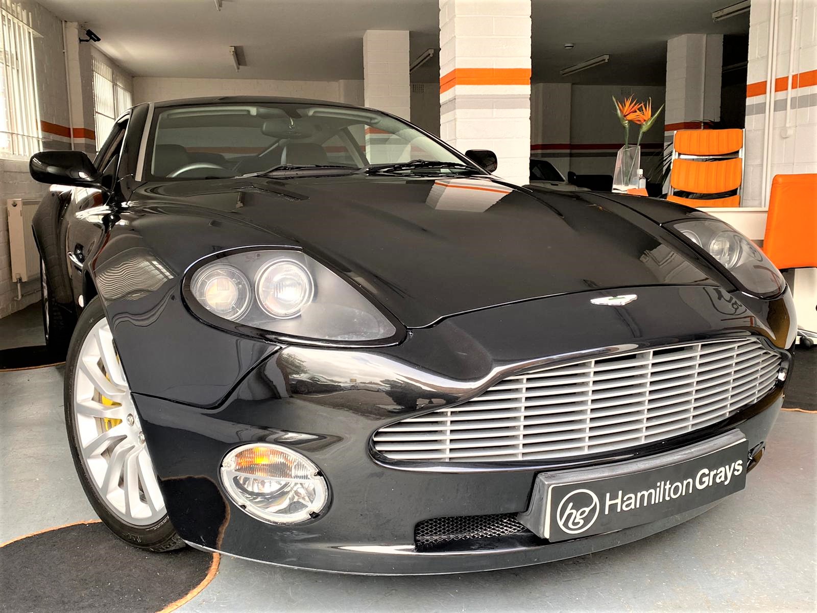 2003 (03) Aston Martin Vanquish 5.9 V12 Auto’ Coupe. In Obsidian Black with Full Black Hide Upholstery. 39k. ‘Old School Magic’.. (SOLD)
