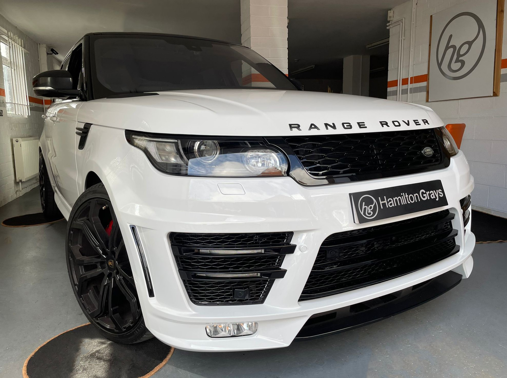 2015 (65) Range Rover Sport 3.0 SD V6 Autobiography Dynamic Auto 4WD. In Polaris White with Black Leather. Full Barugzai Body Kit and Alloys [22”]. 43,451m. FLRSH. Striking Car  (SOLD)